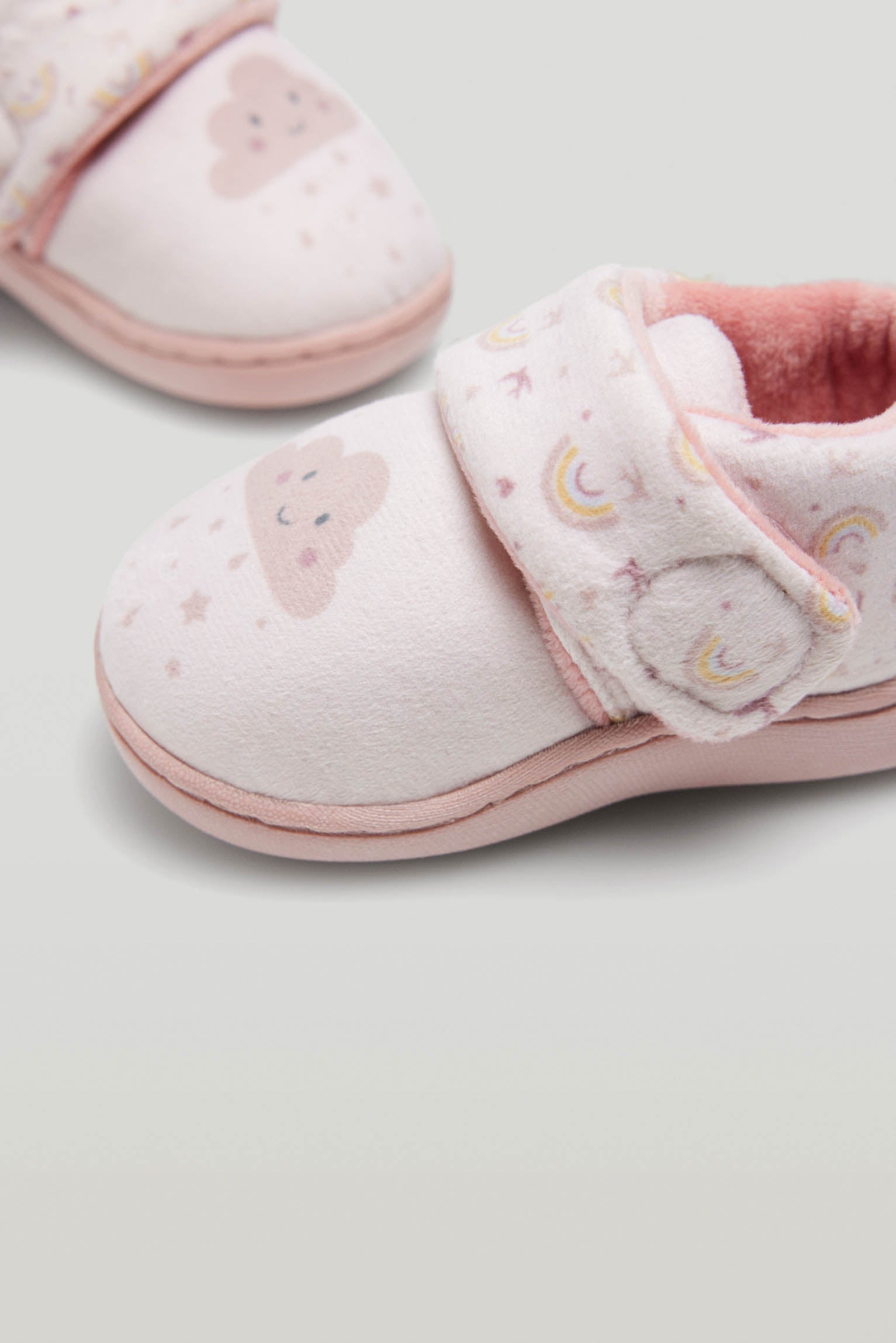 Baby house slippers with adhesive closure